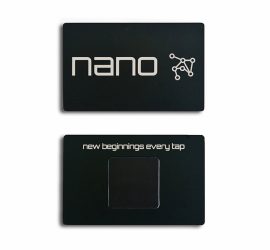 © 2021 RKS Photography | https://www.rksshots.com. Photo by RKS Photography. Two black rectangular cards; one says "nano" with a network icon, the other says "new beginnings every tap.